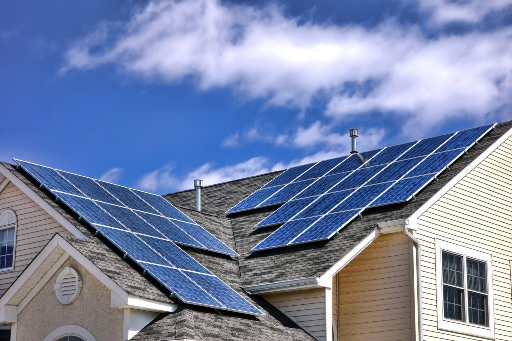 A house with solar panels on the roof.